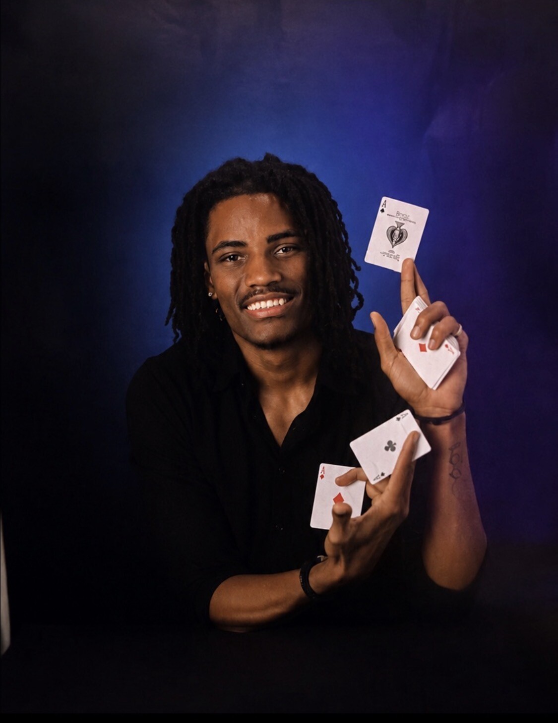 Jaden performing close-up card magic